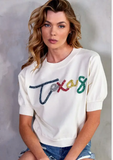 IVORY SHORT SLEEVE SWEATER WITH MULTI COLOR TEXAS APPLIQUE LETTERS