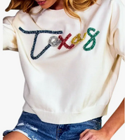 IVORY SHORT SLEEVE SWEATER WITH MULTI COLOR TEXAS APPLIQUE LETTERS