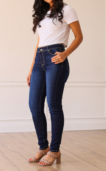 THE PARIS HIGH RISE DARK WASH SKINNY JEANS