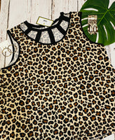 LEOPARD TANK WITH BLACK TRIM AND CUT OUT NECKLINE