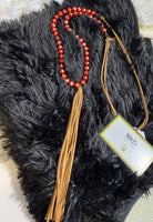 FROSTED RUST BEADED NECKLACE WITH SUEDE TASSEL