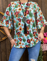 TURQUOISE WESTERN PRINTED TOP WITH CACTUS SUNFLOWERS AND STARS
