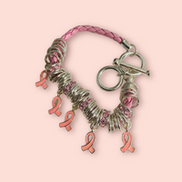 BREAST CANCER AWARENESS CHARM ON LEATHER BRACELET